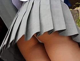 Schoolgirl Teen Uniform: A Sneak Peek at Her Skirt'