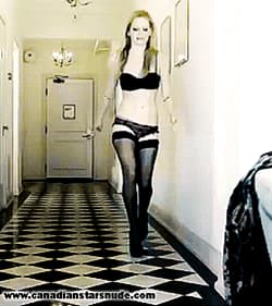 Sexy singer Avril Lavigne walking in stockings and panties gif'