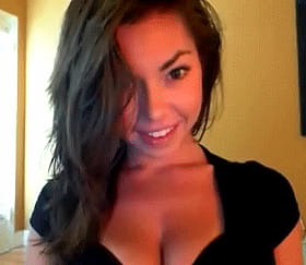 Brunette Babe with Big Tits Smiling for the Camera'