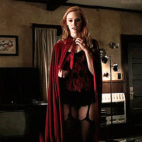 Babes, Celebrity, Hot: Red-Clad Vampire Strikes a Pose'