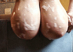 Big Tits Bathing in Foamy Oil'