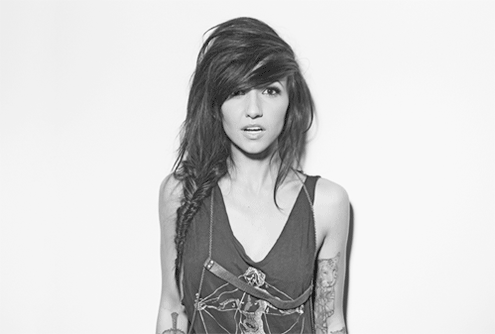 Brunette Babe with a Twisty Braid and Tattoos picture 1 of 1