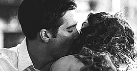 Sexy Pics: Man and Woman Kissing in Bedroom'