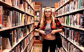 Blonde Babe Shows Off Her Boobs in the Library'