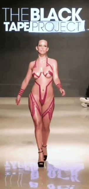 Blonde Babe with Big Tits Walks the Runway in a Skin-Tight Outfit picture 1 of 1
