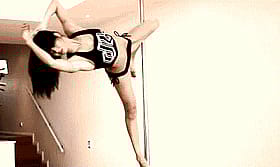 Fit Babe Spins on Pole: Athletic Pole Dance'