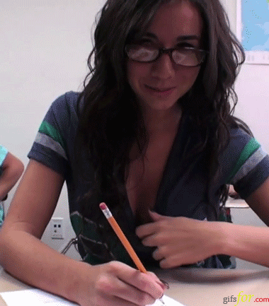 Sexy Chick in Glasses Writes on Table picture 1 of 1