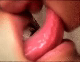 Lesbian Licking: Two Girls Kissing and Licking Each Other's Lips'
