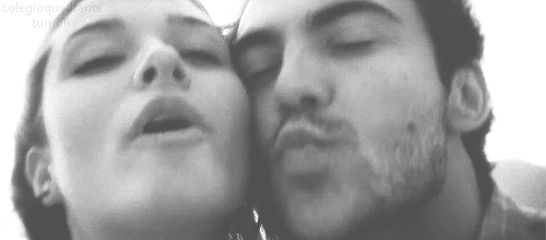 Smoochin' with the chick: A steamy, close-up of two faces picture 1 of 1